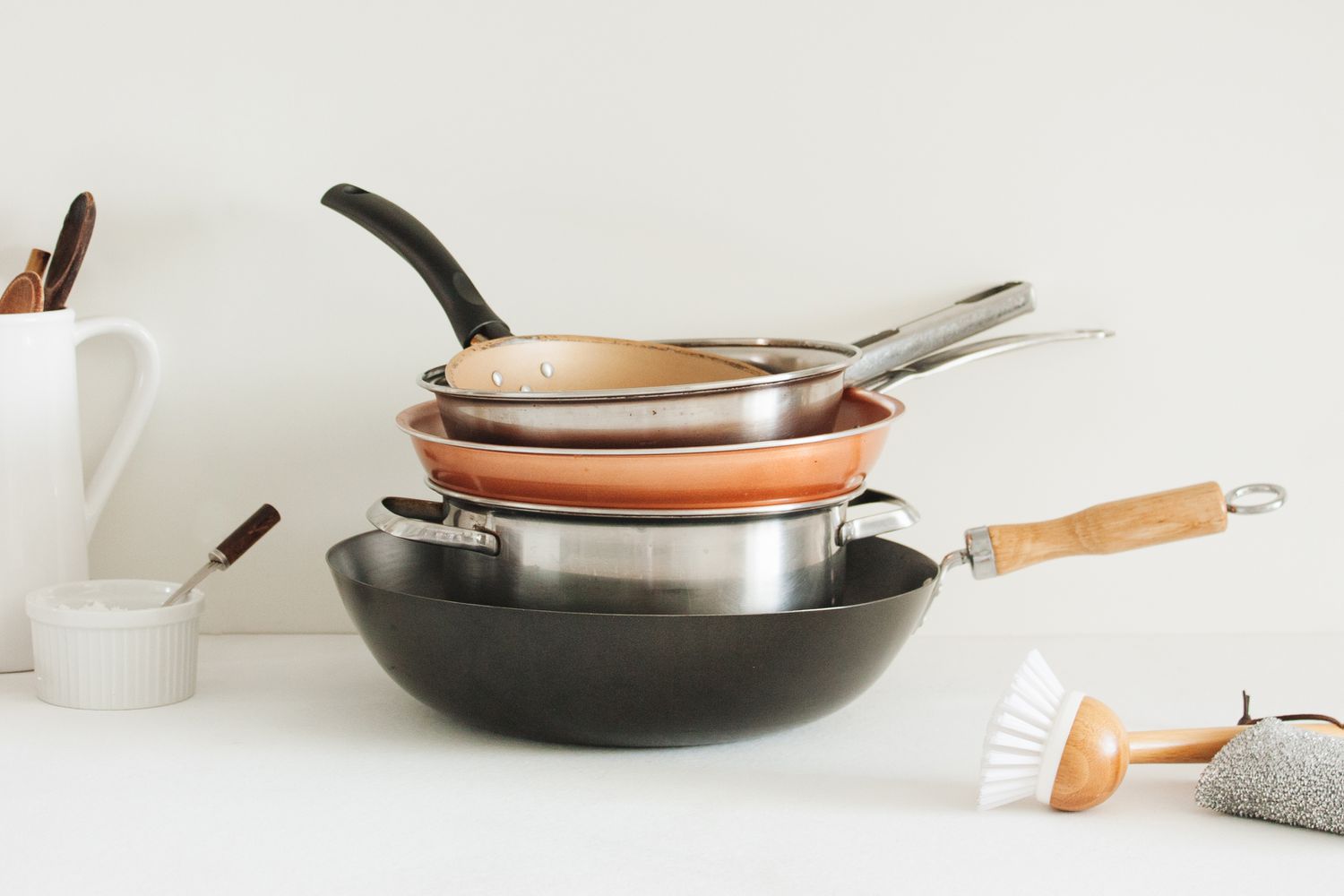 How are non-stick tadka pans different from regular pans?